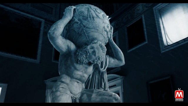 Still from the film Parthenope: the Farnese Atlas in a room of the National Archaeological Museum of Naples